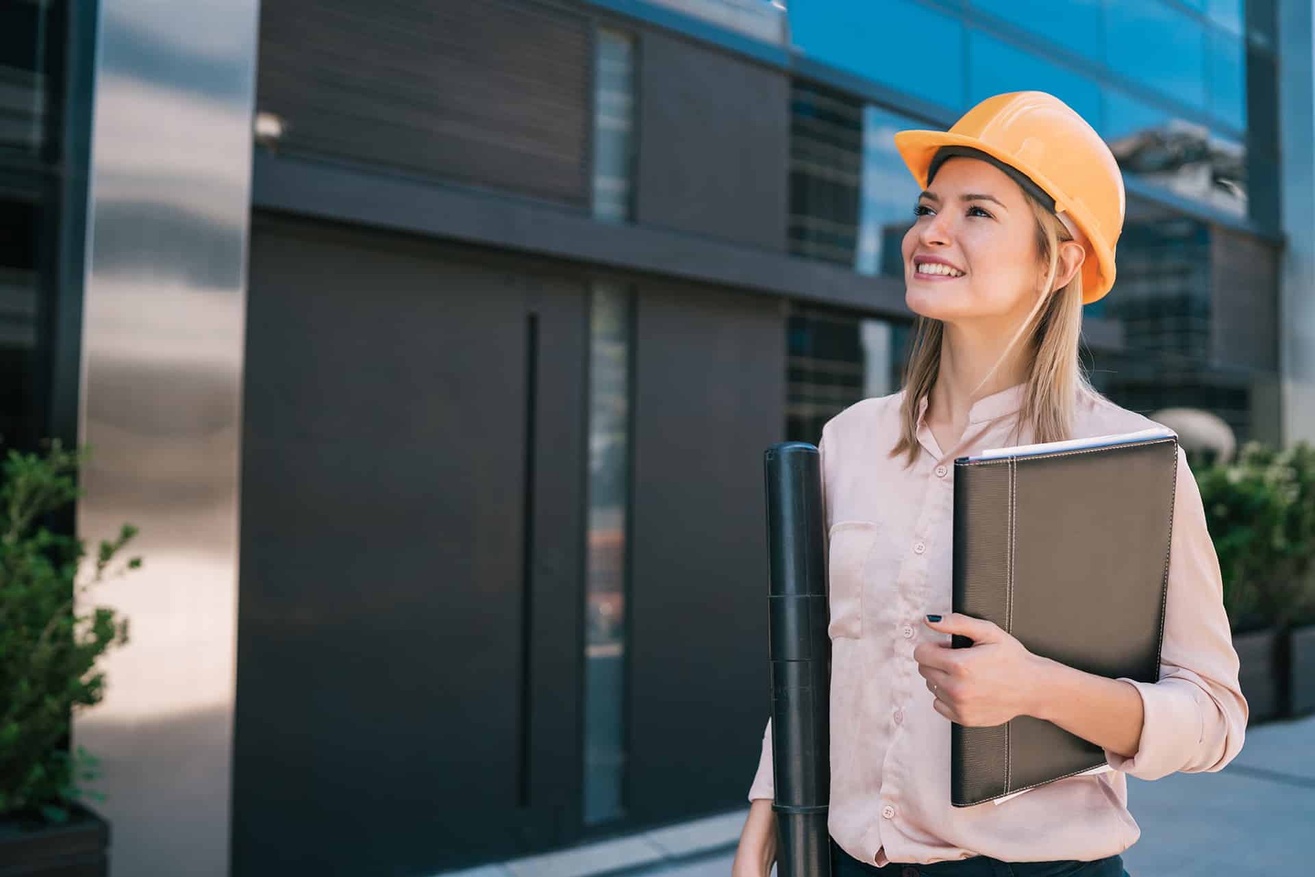 architect looking at an modern building