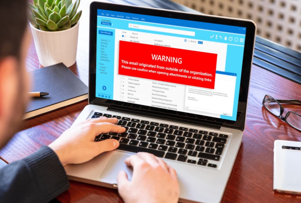 email attachment warning appearing on computer screen