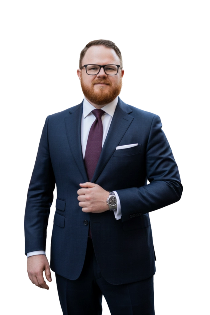 Jeff Myers standing in a business suit